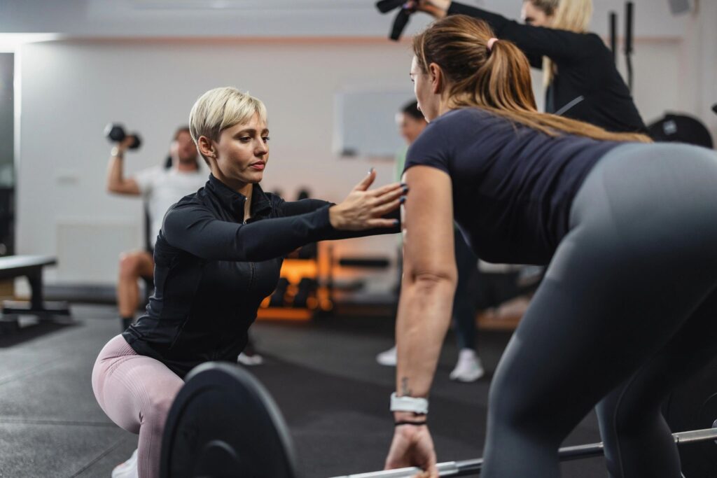 Fitness Instructor Coaching During Exercise Session
